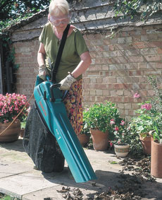 Electric Leaf Blower Vacuum in use 1 Electric Leaf Blower Vacuum