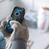 Clear view of the rubberized keypad and function buttons on a Bosch 50m laser measure.
