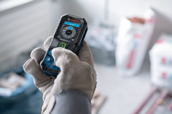 Clear view of the rubberized keypad and function buttons on a Bosch 50m laser measure.