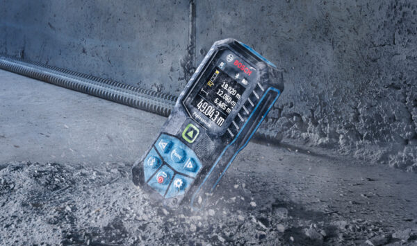 Bosch 50m laser measure impacting the ground to demonstrate 1.5m drop resistance.